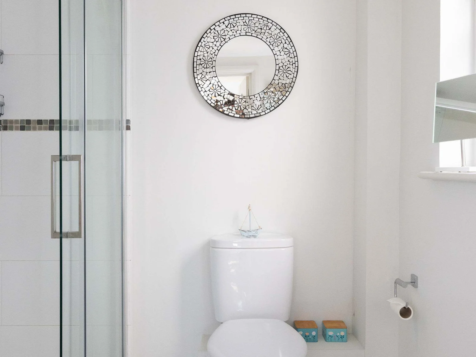 Bright shower room with clean, modern finish
