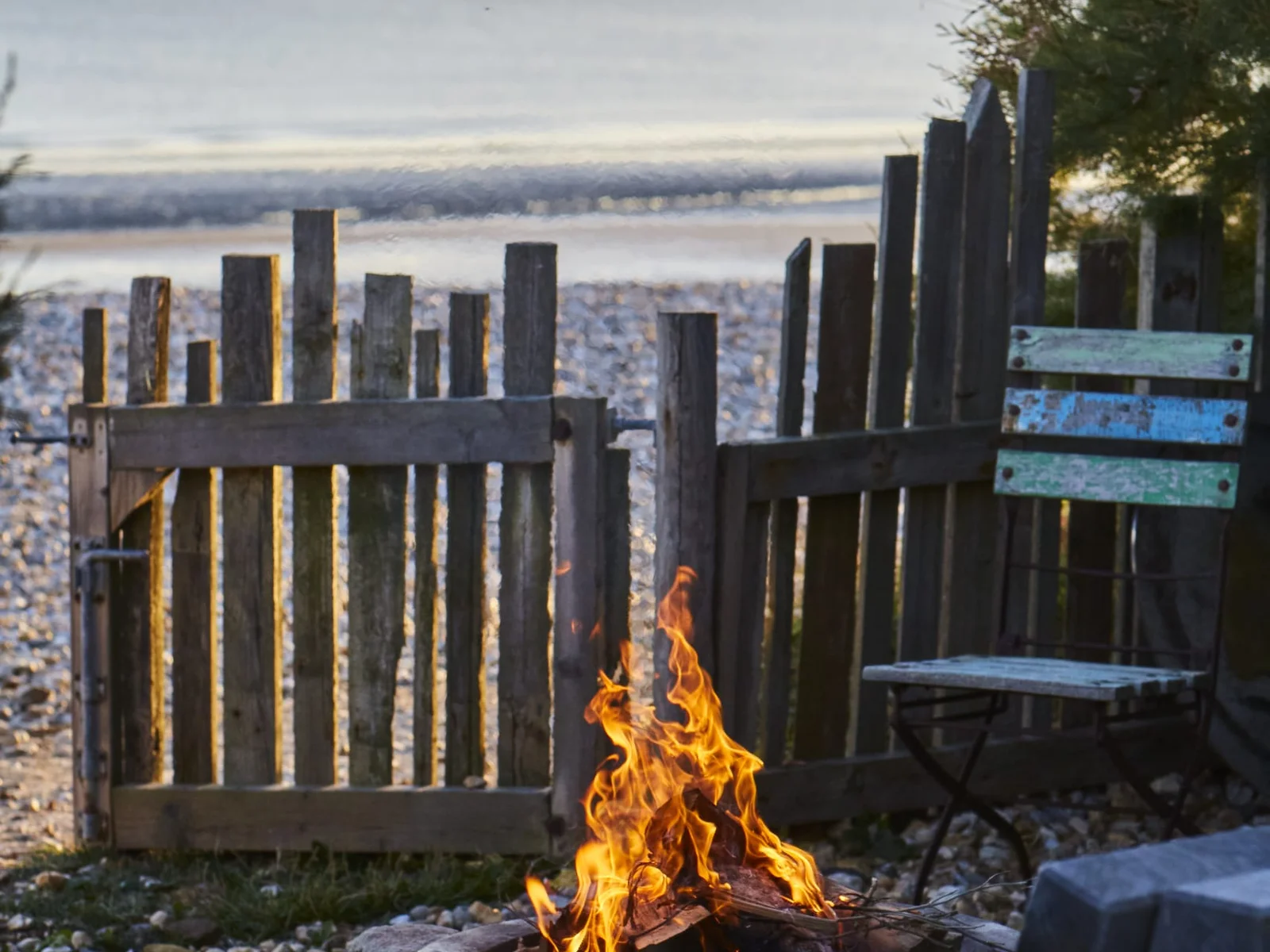 Light the fire pit as the sunsets, roast some marshmallows and chat long into the evening to lapping waves.