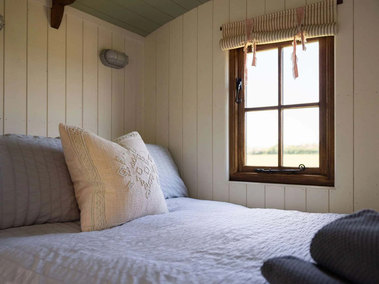 Cosy up in the comfortable bed, enjoying unspoilt countryside views after a day of exploring