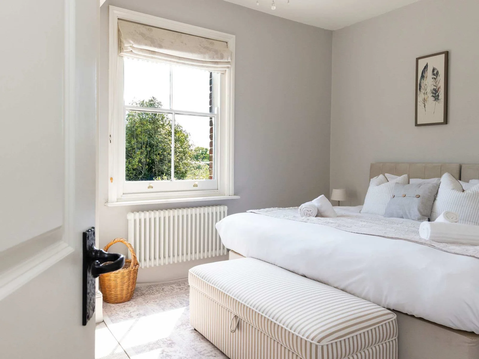 Bright and restful bedroom with peaceful garden outlooks.