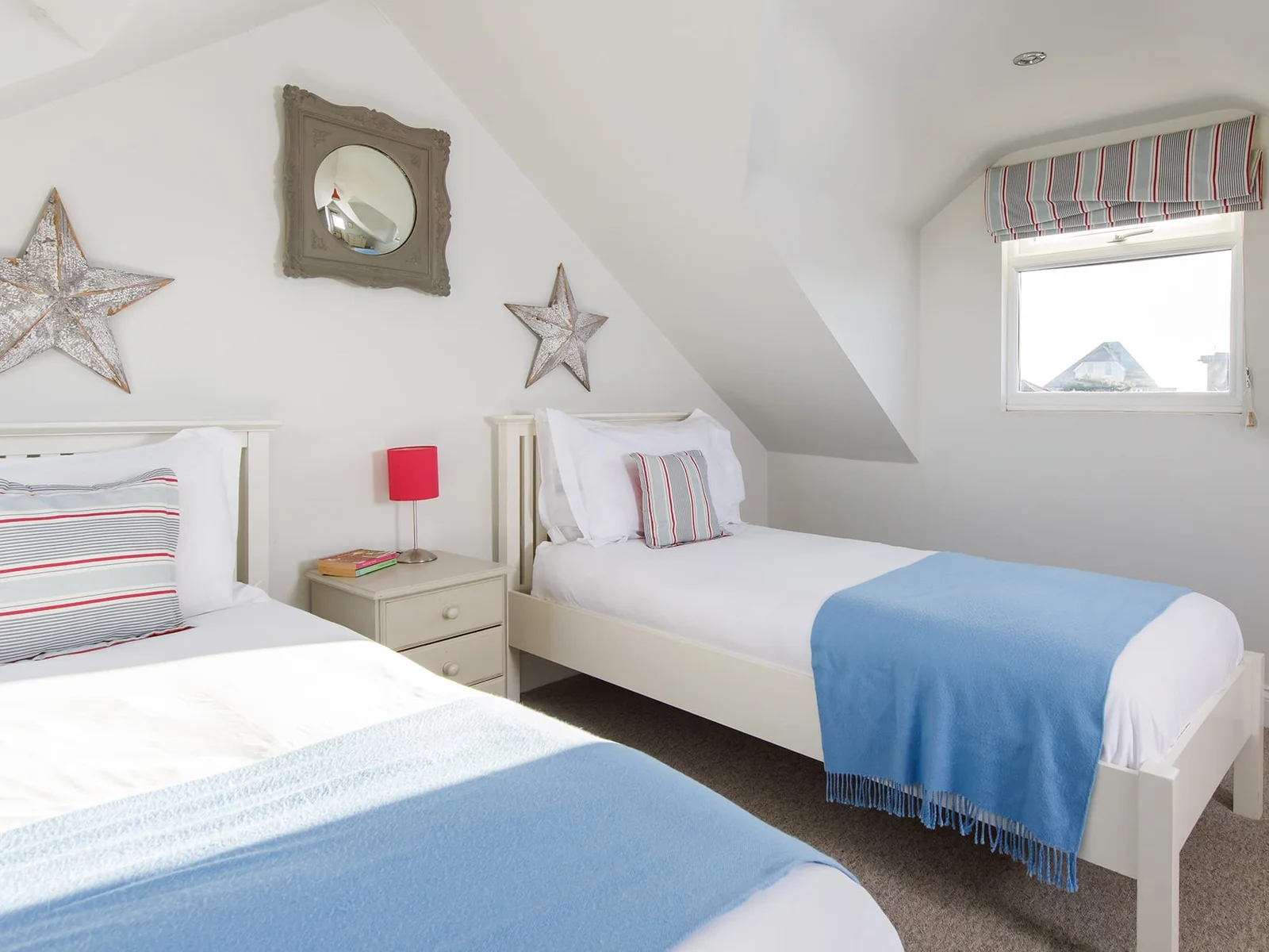 There are throws, additional blankets, cushion and pillows for your comfort.