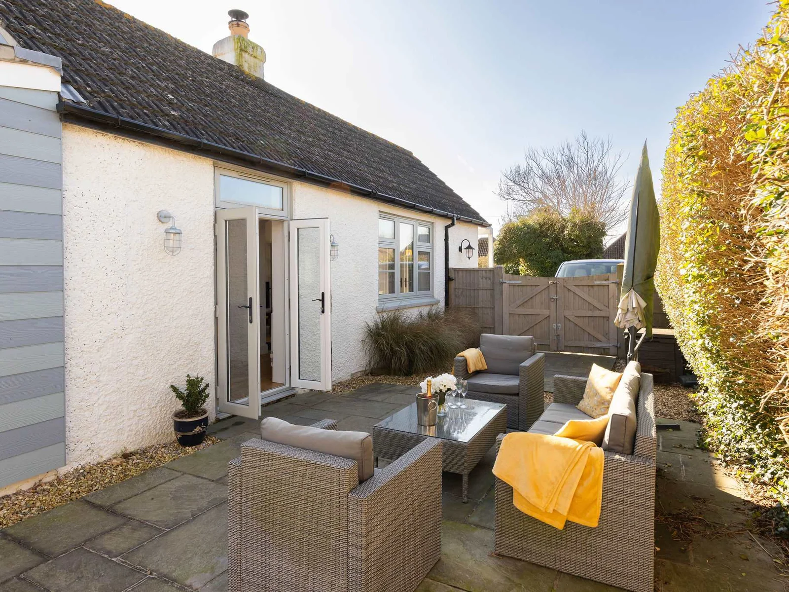 Enjoy sunny mornings and evenings on the secluded patio, perfect for coffee or al fresco dining.