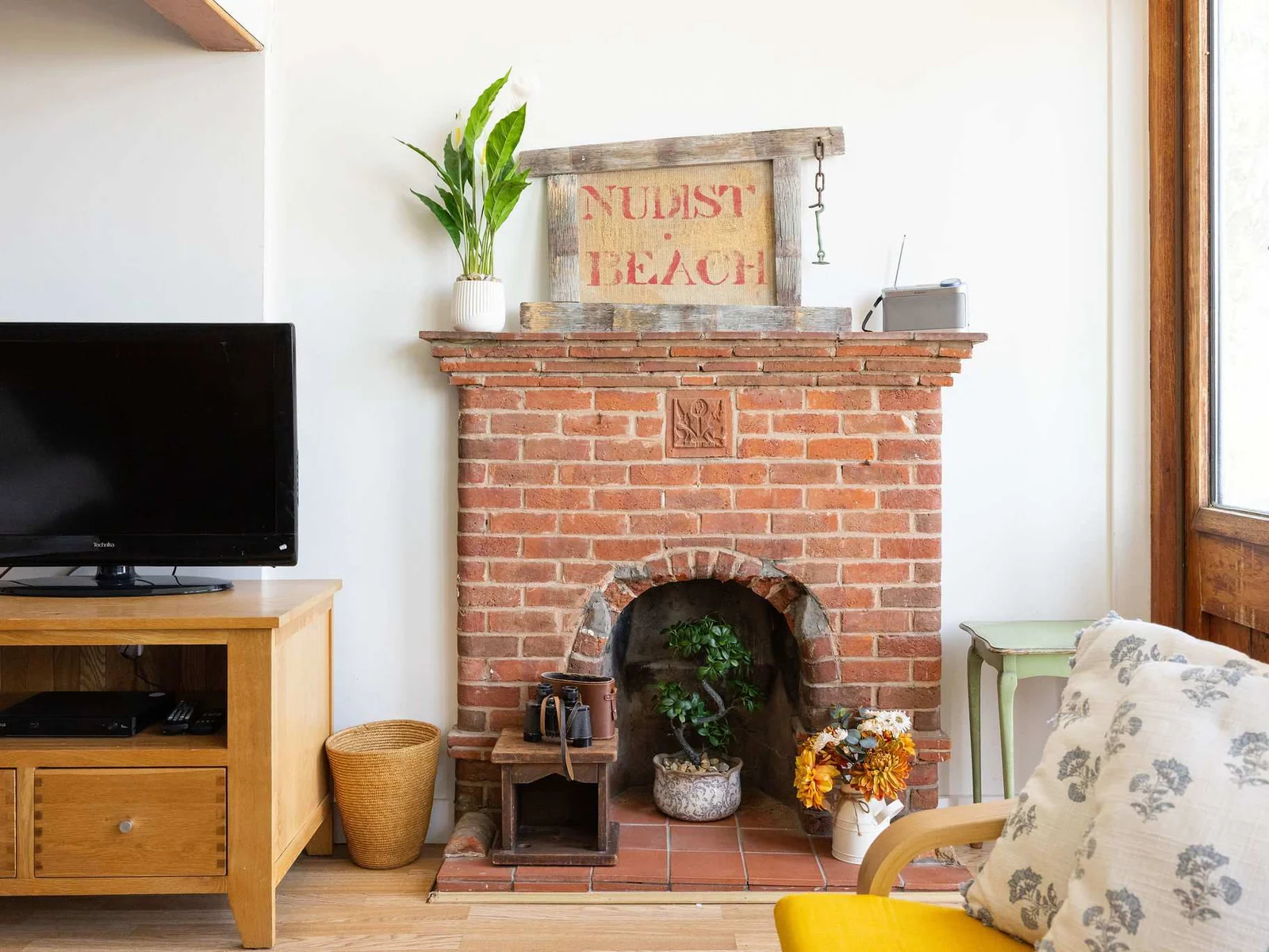 Original fireplace with playful seaside charm