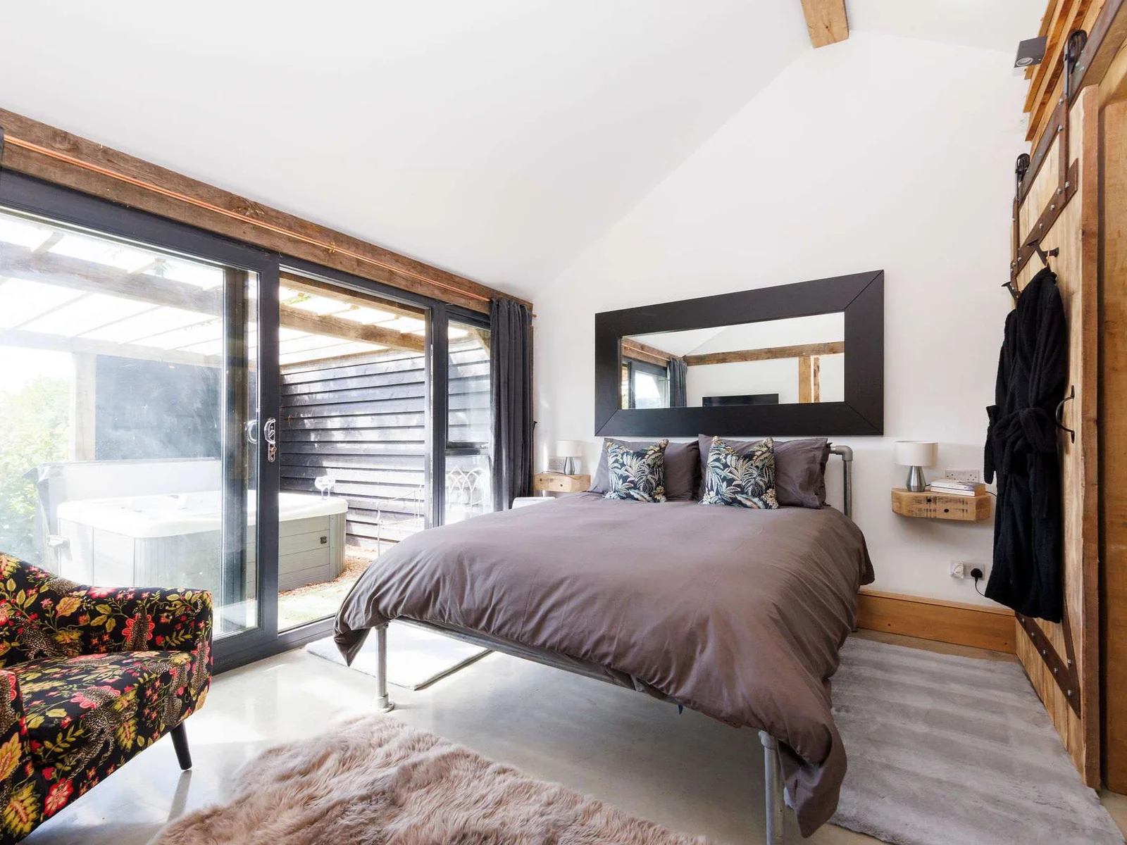 The master double bedroom with bath robes to enjoy.