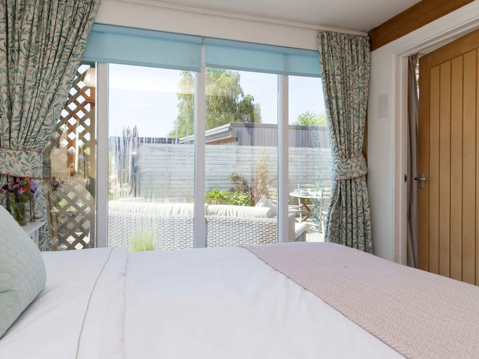 The master bedroom has a comfy king bed, with quality linen and bedding.