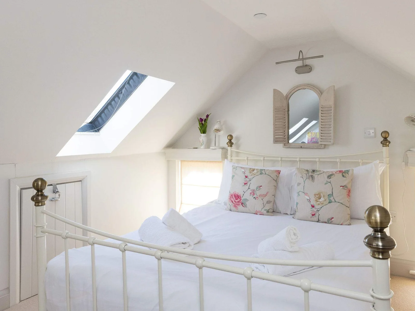 Peaceful top-floor bedroom with cosy, tucked-away feel