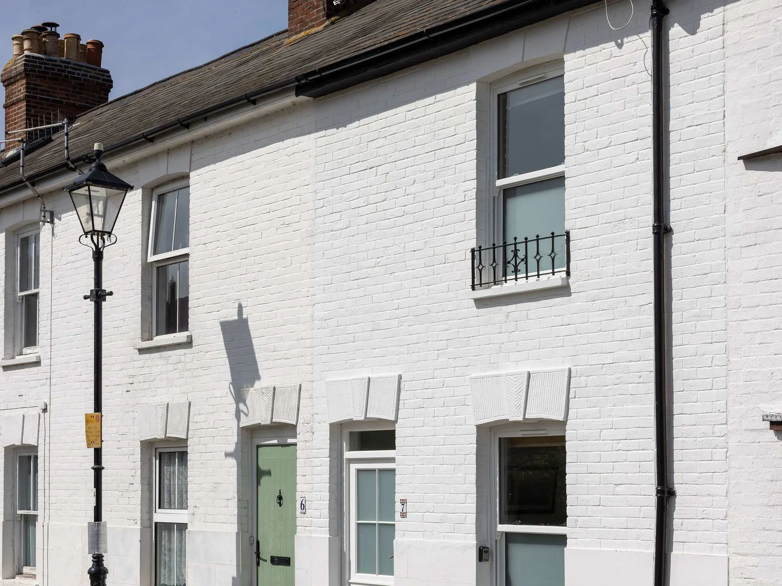 The cottage is a charming terraced home, just moments from the waters edge.