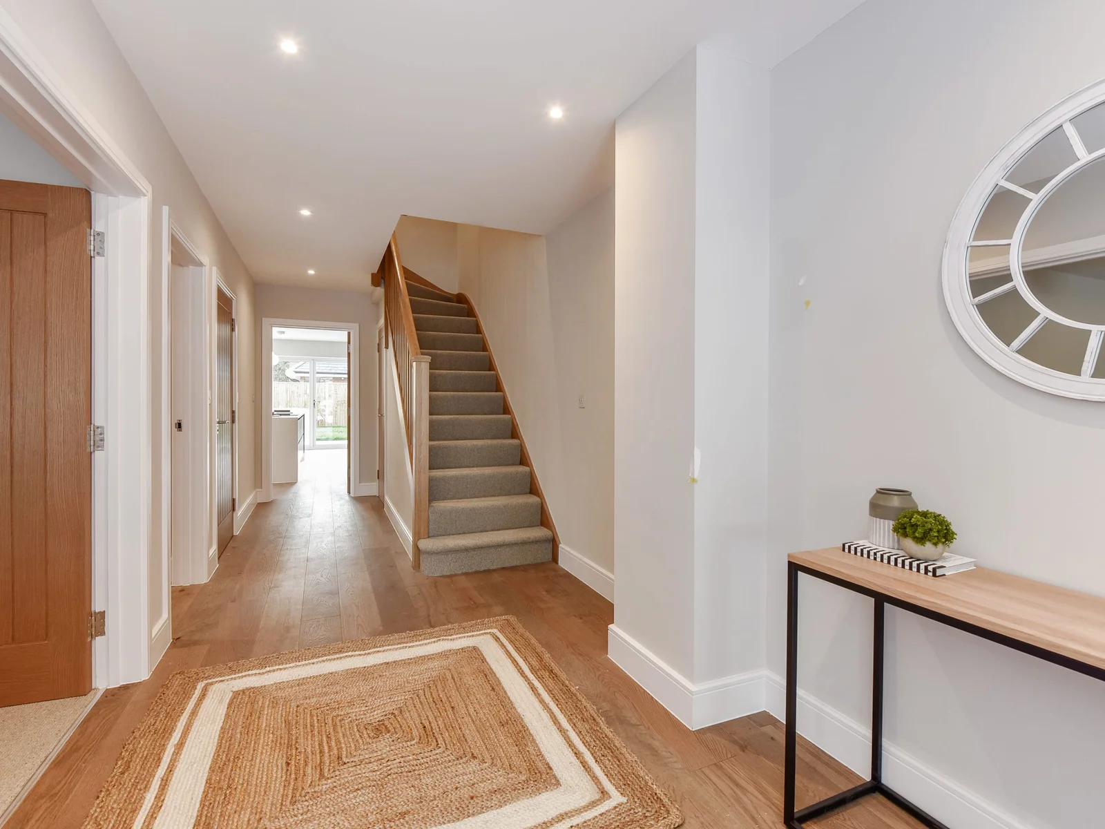 A large light and bright hallway welcomes you as you enter the property.