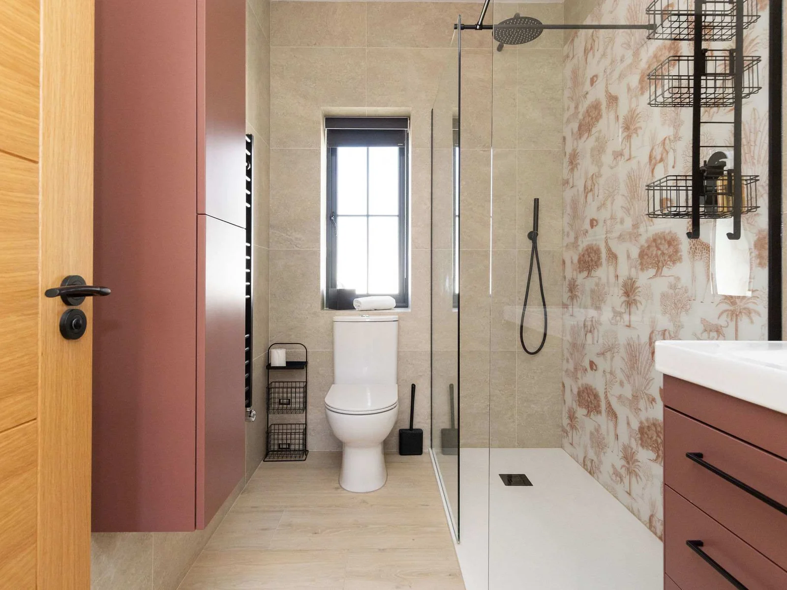 Refresh after countryside walks in an elegant ensuite, complete with walk-in shower and earthy modern tones.