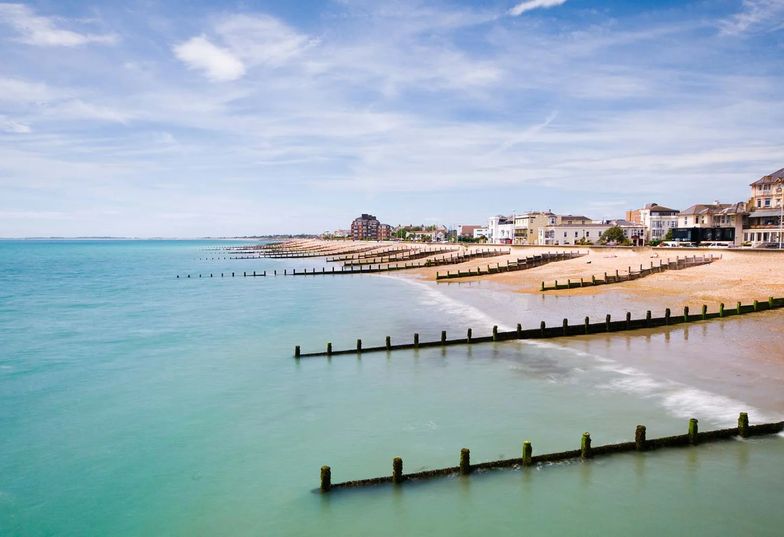 Walk along the beach to the pier and enjoy a bit of shopping in the main part of town