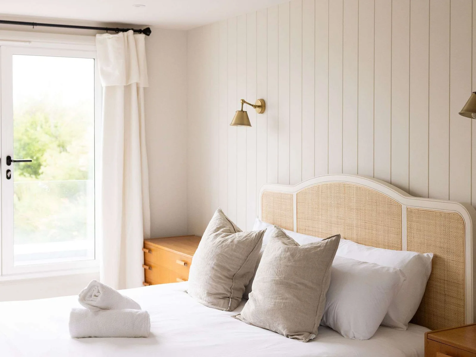 Coastal-inspired interiors offer a calming and relaxing stay by the sea.