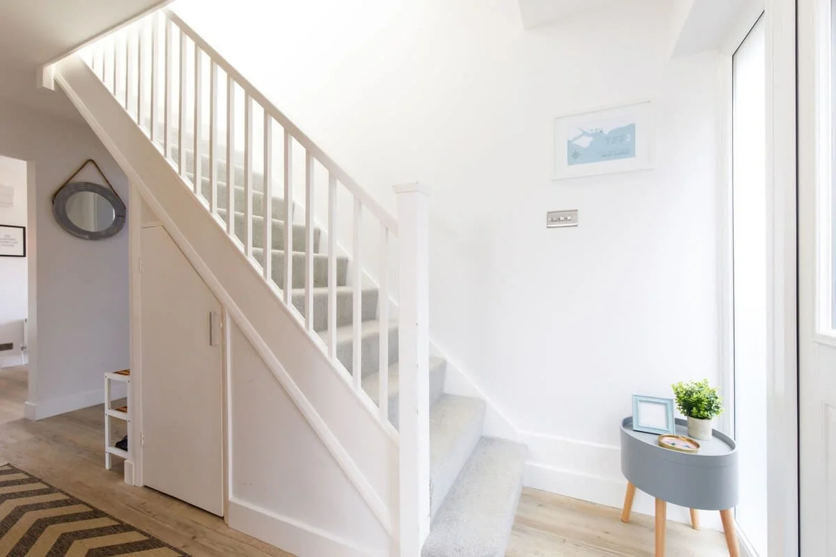 As you enter there is a bright and airy entrance hall.