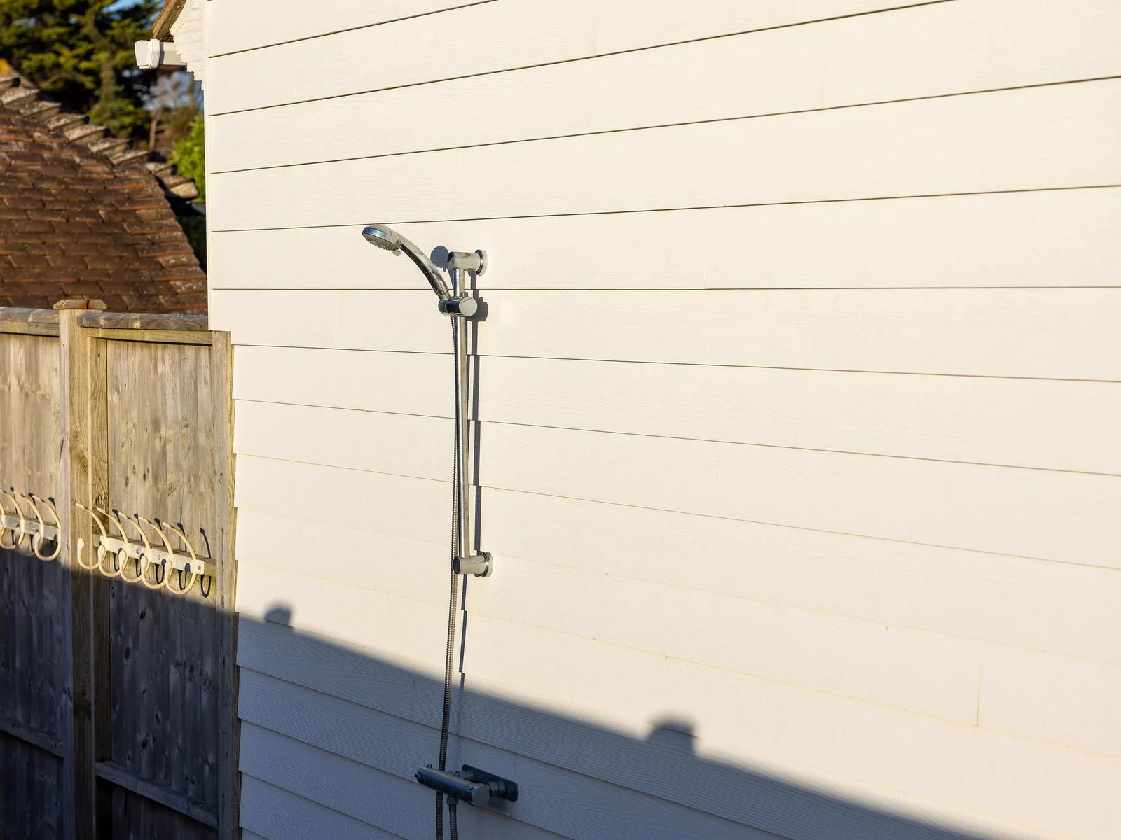 Outdoor shower for rinsing off sand.