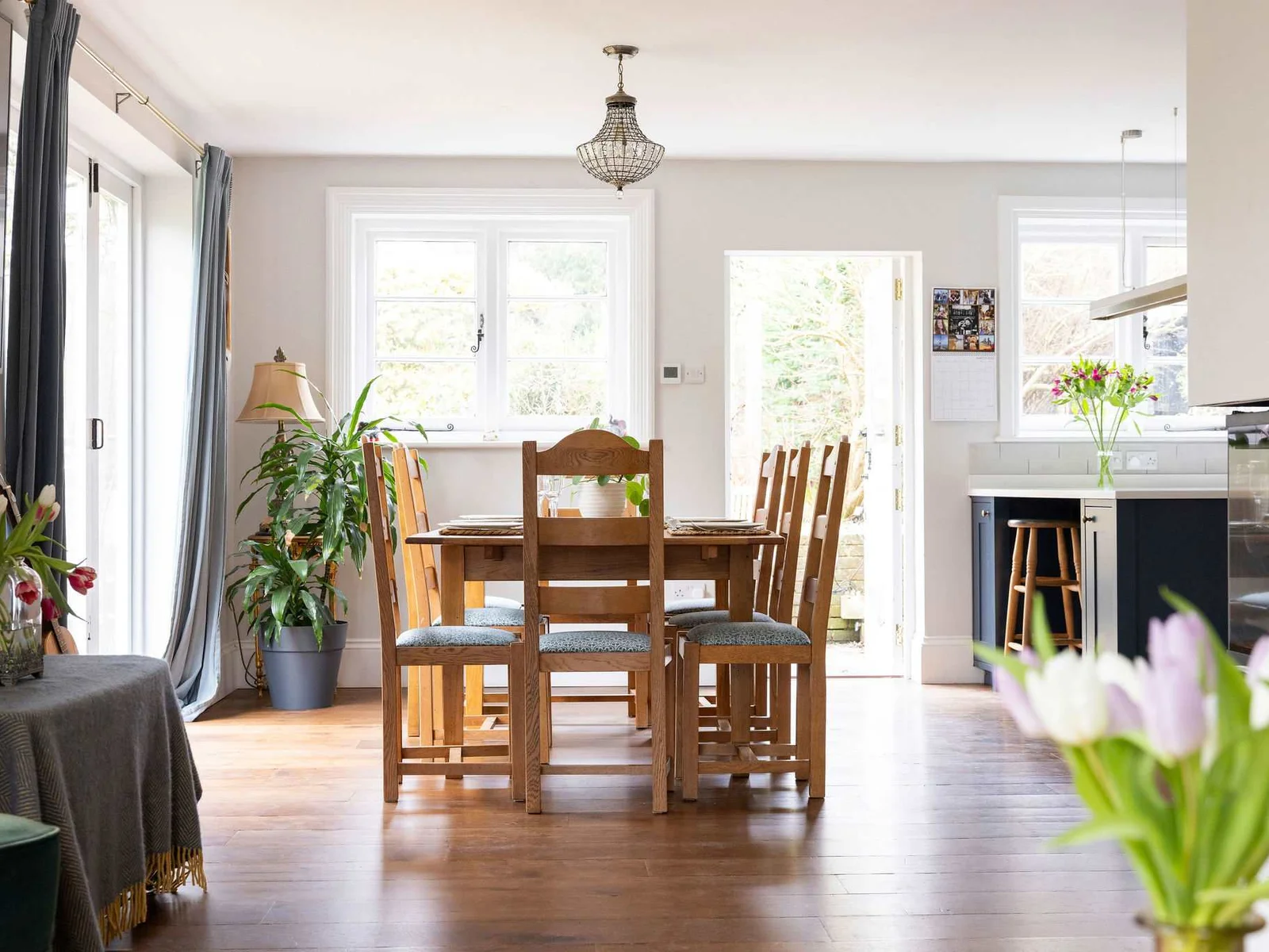 A welcoming dining space with natural light and a connection to the outdoors