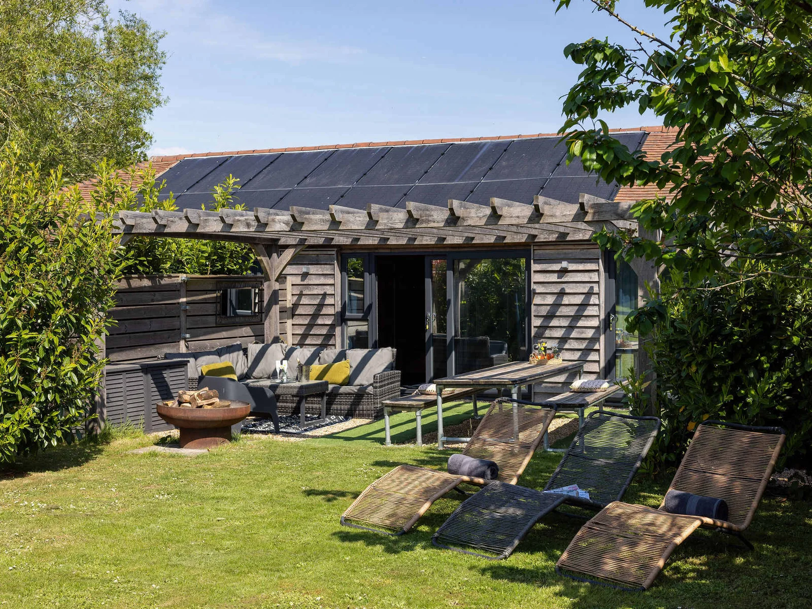 Soak up the sun and enjoy tranquil rural views from this beautifully landscaped outdoor oasis.