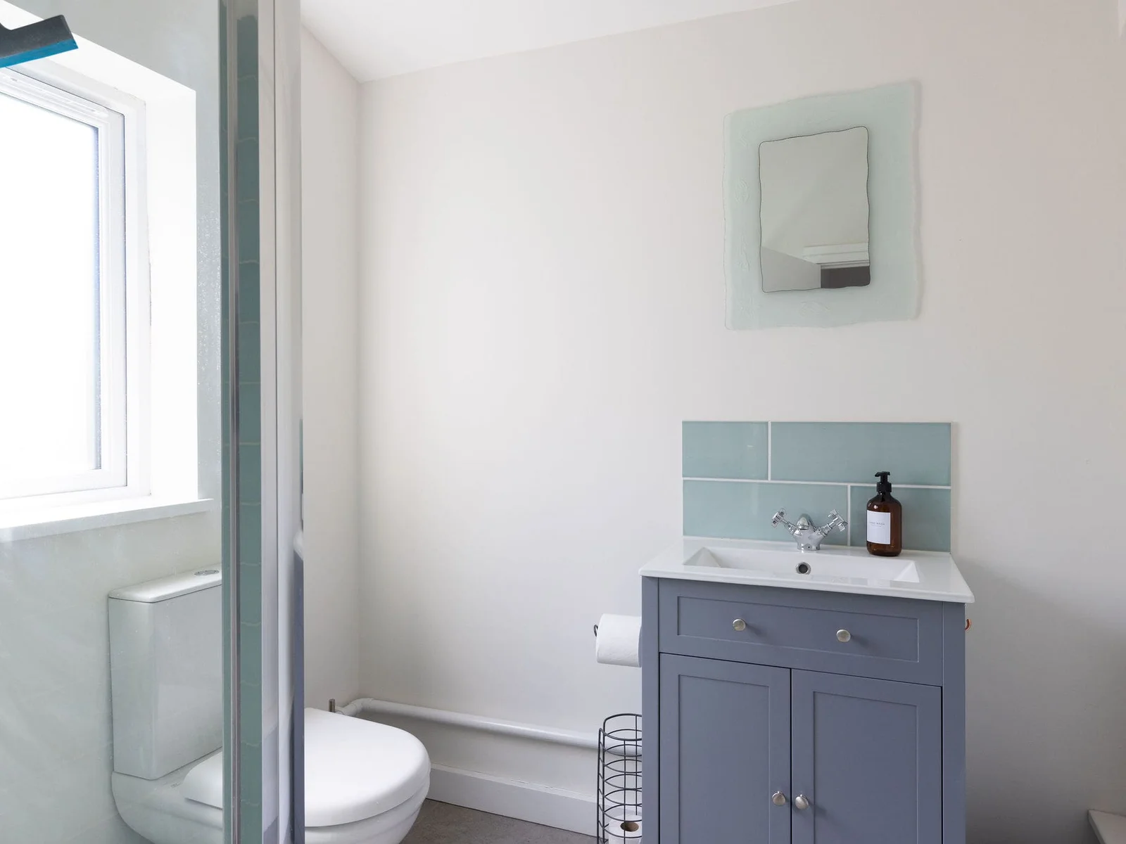 Bright bathroom with walk-in shower
