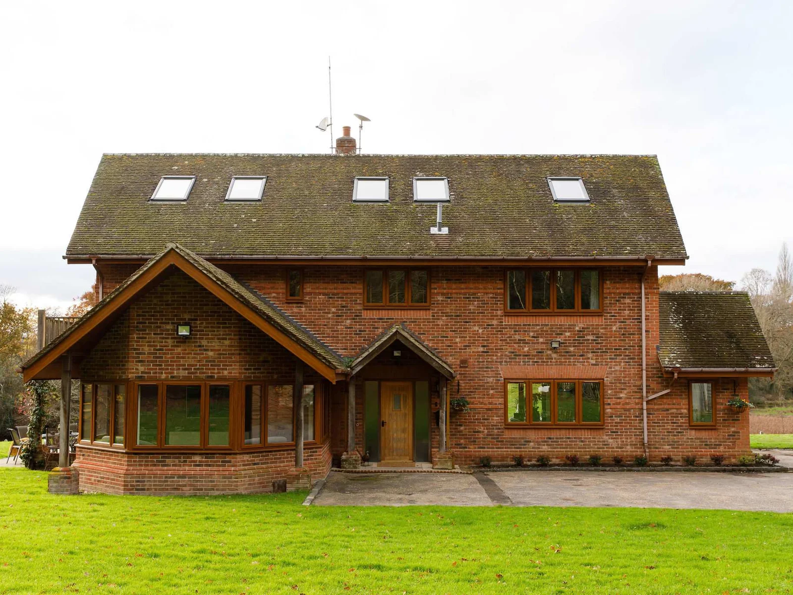 The exterior of the home, with plenty of driveway space.