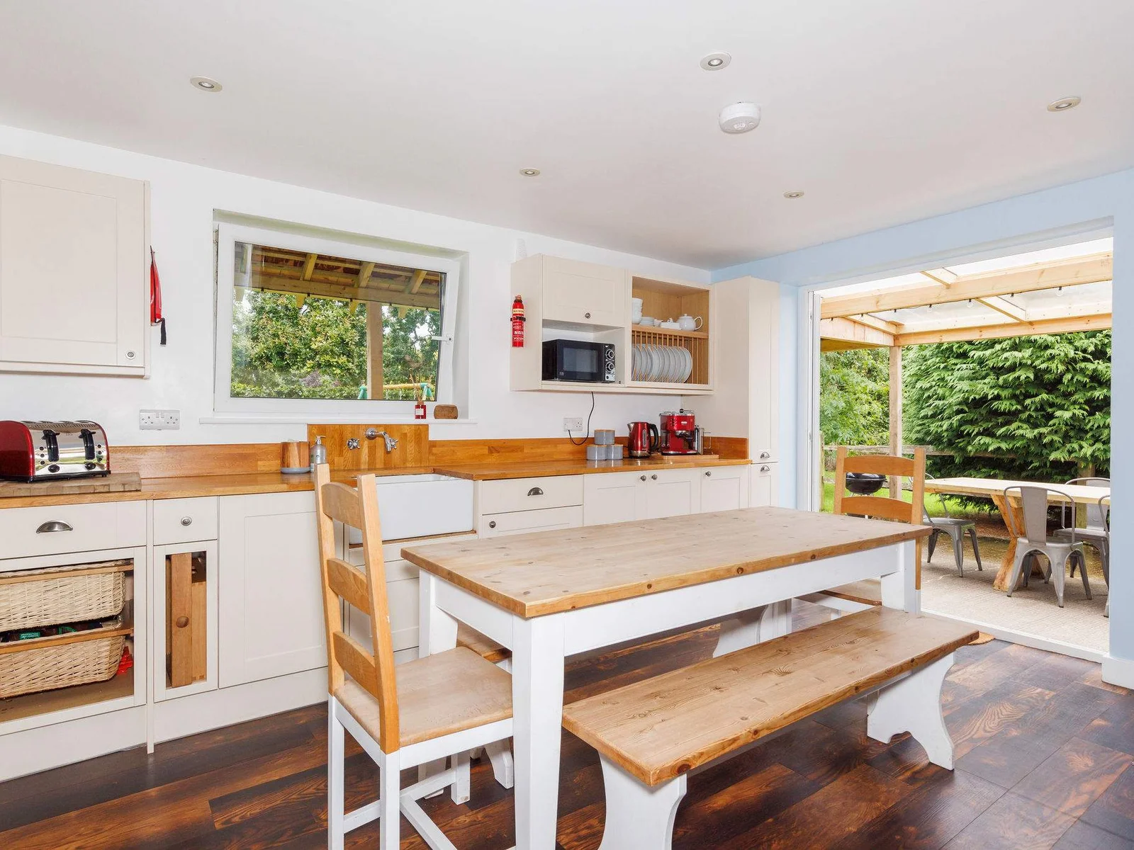 The dining table seats up to 8 guests to enjoy meals together.