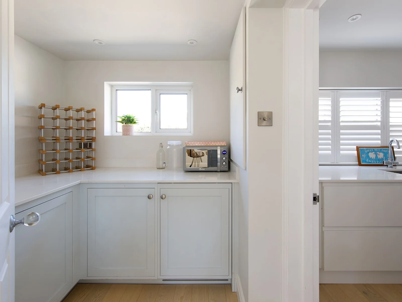 The utility is an impressive extension of the kitchen with further cabinets, worktops and draws.