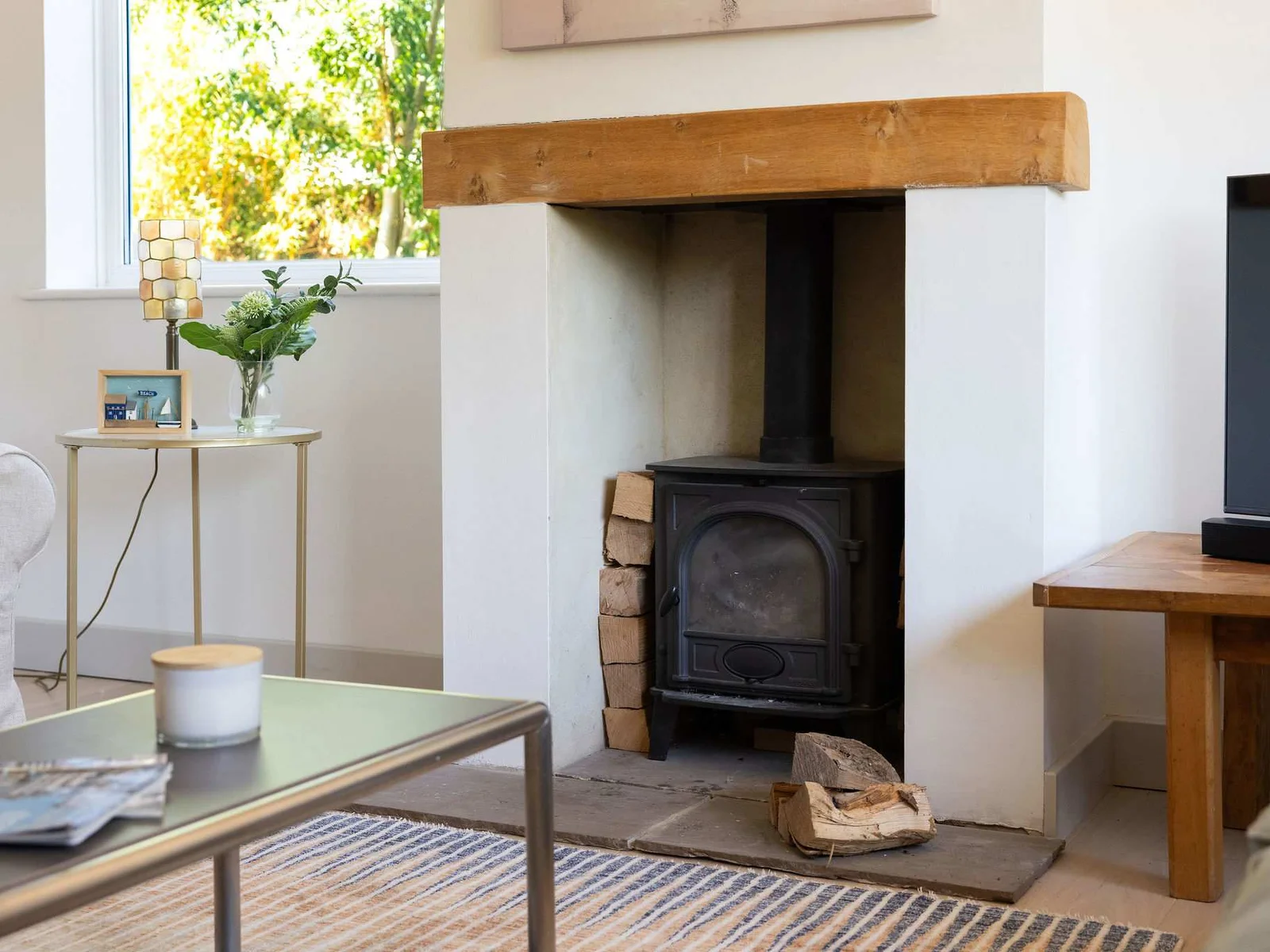 A beautifully bright, contemporary open-plan kitchen and dining space, with a stylish table comfortably seating six — perfect for relaxed breakfasts, long lunches and memorable meals together.