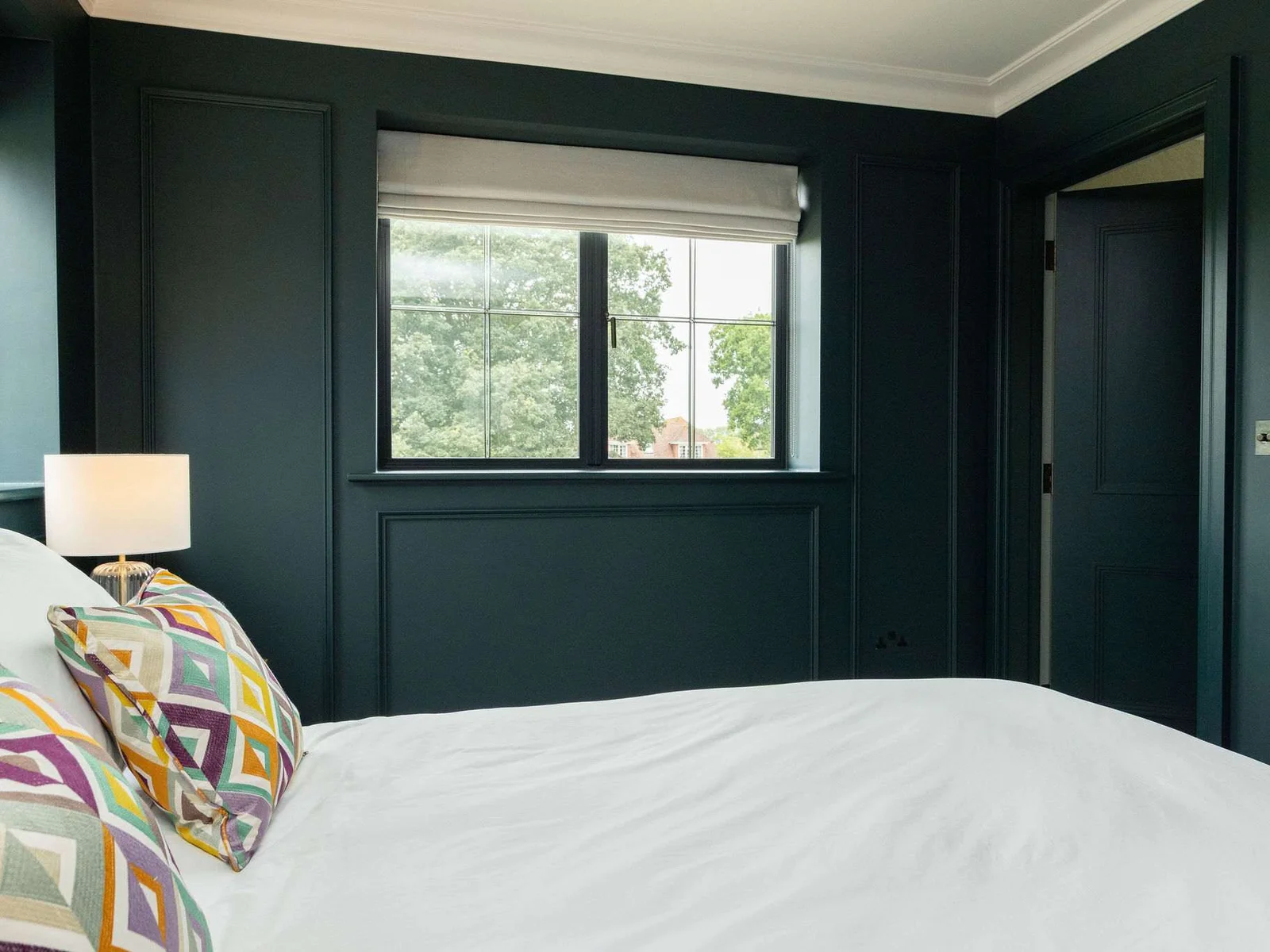 Peaceful outlook from this bold and elegant bedroom