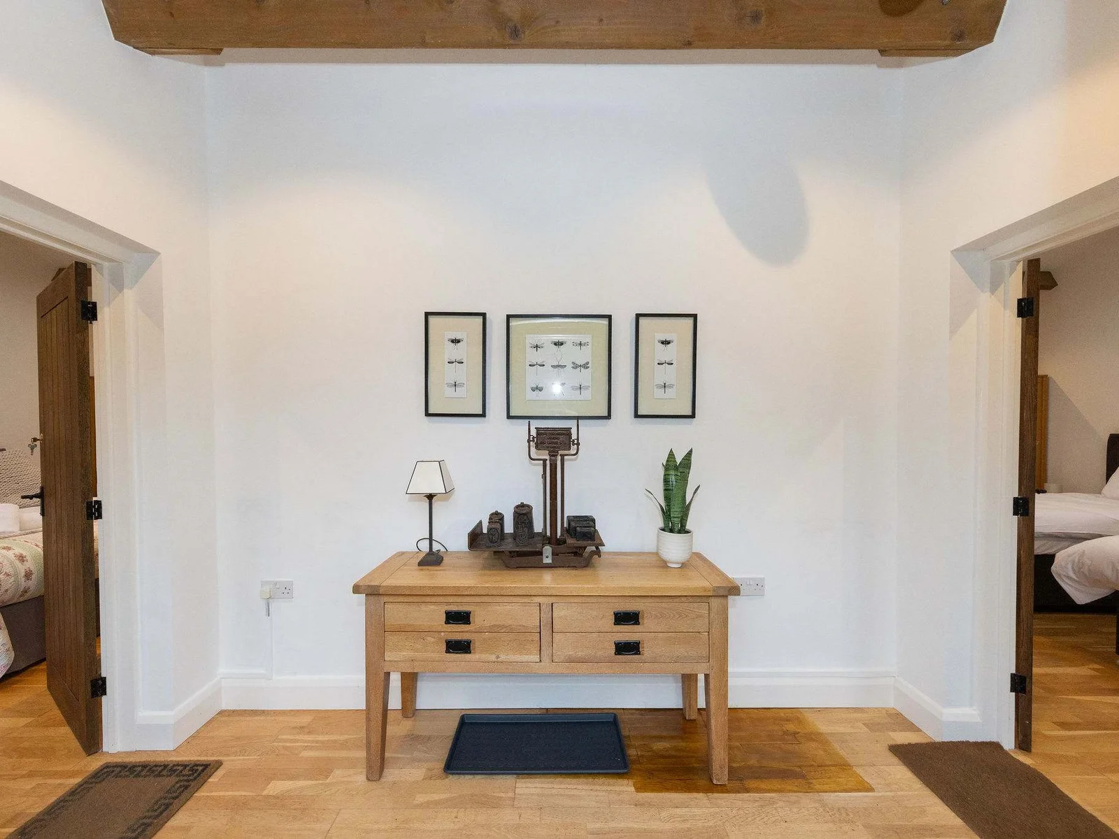 Two self contained ensuite bedrooms share an entrance hallway but have own private, lockable doors to each.