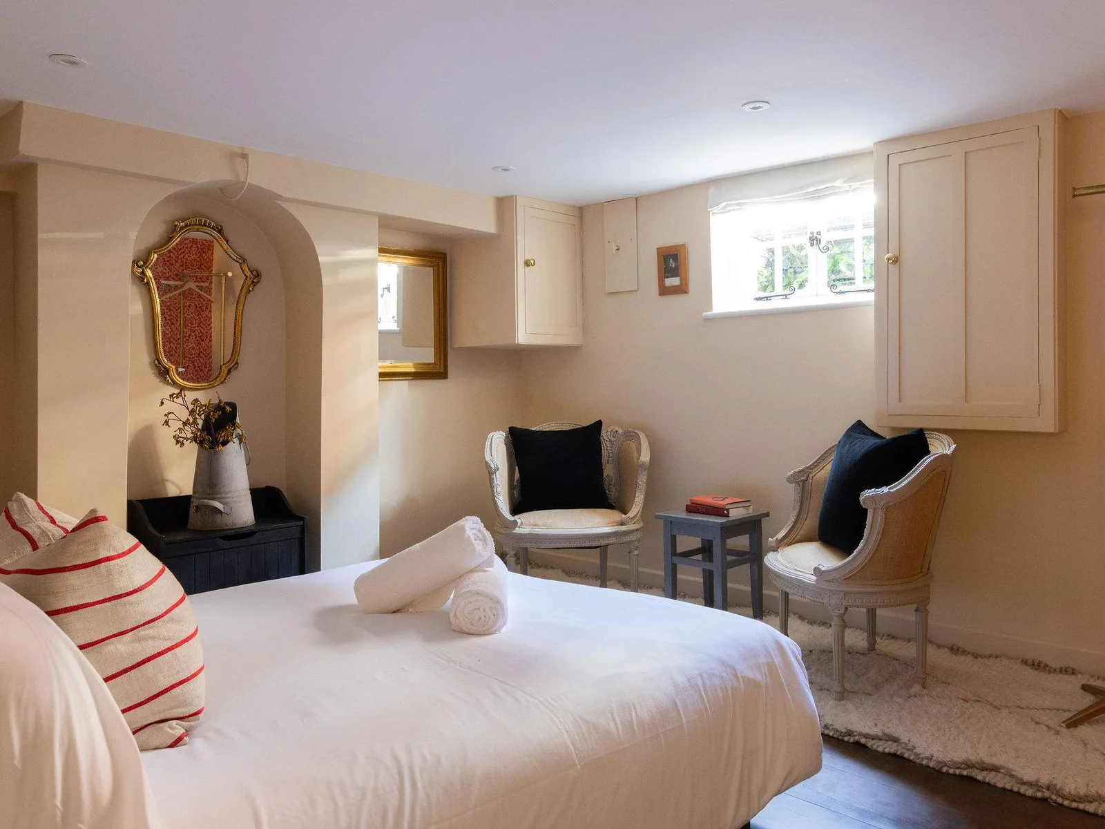 Beautifully styled basement bedroom with boutique hotel feel