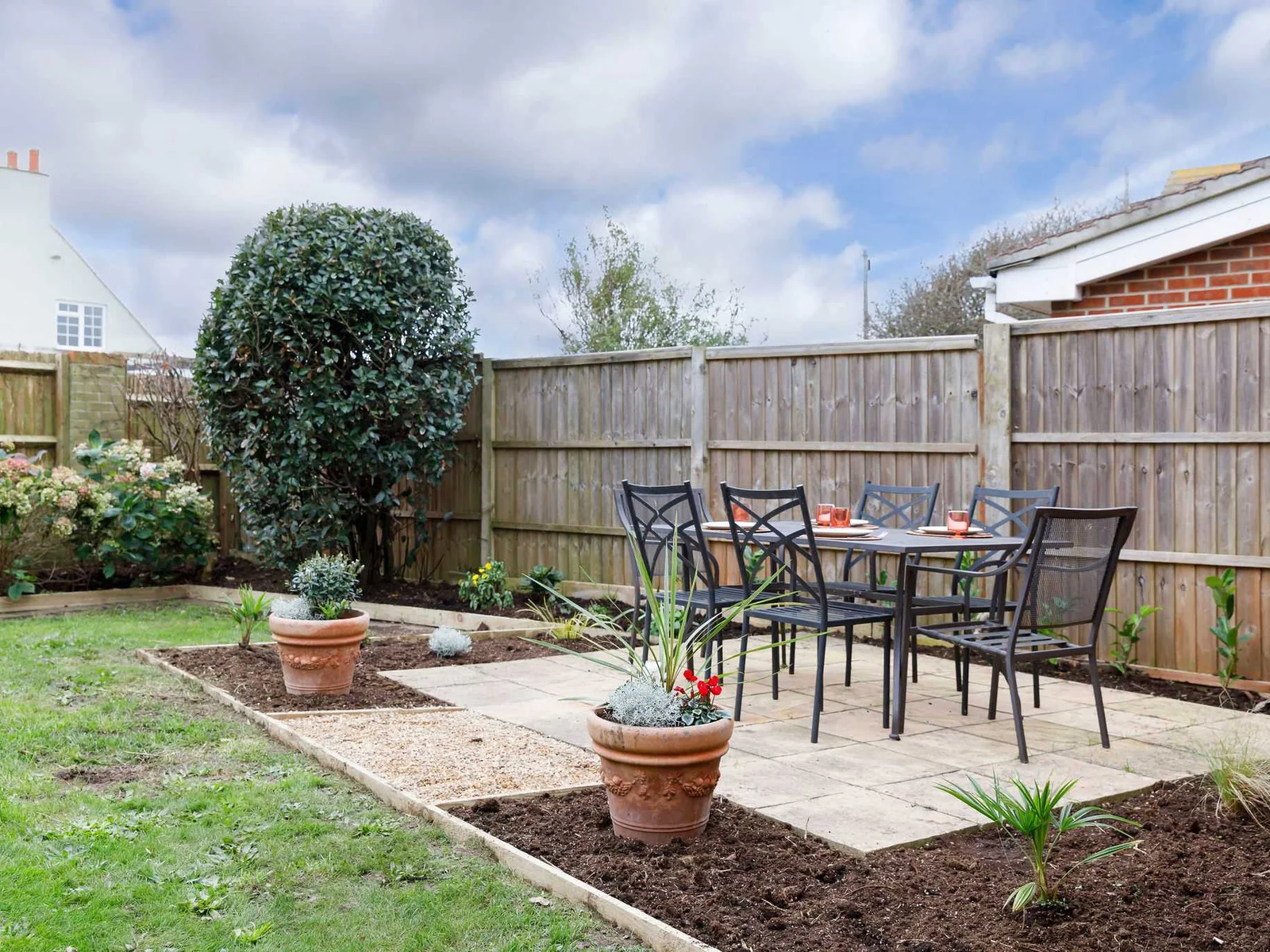 The patio area has recently been completd, with new borders and plants (photos to be update spring/summer 2025).