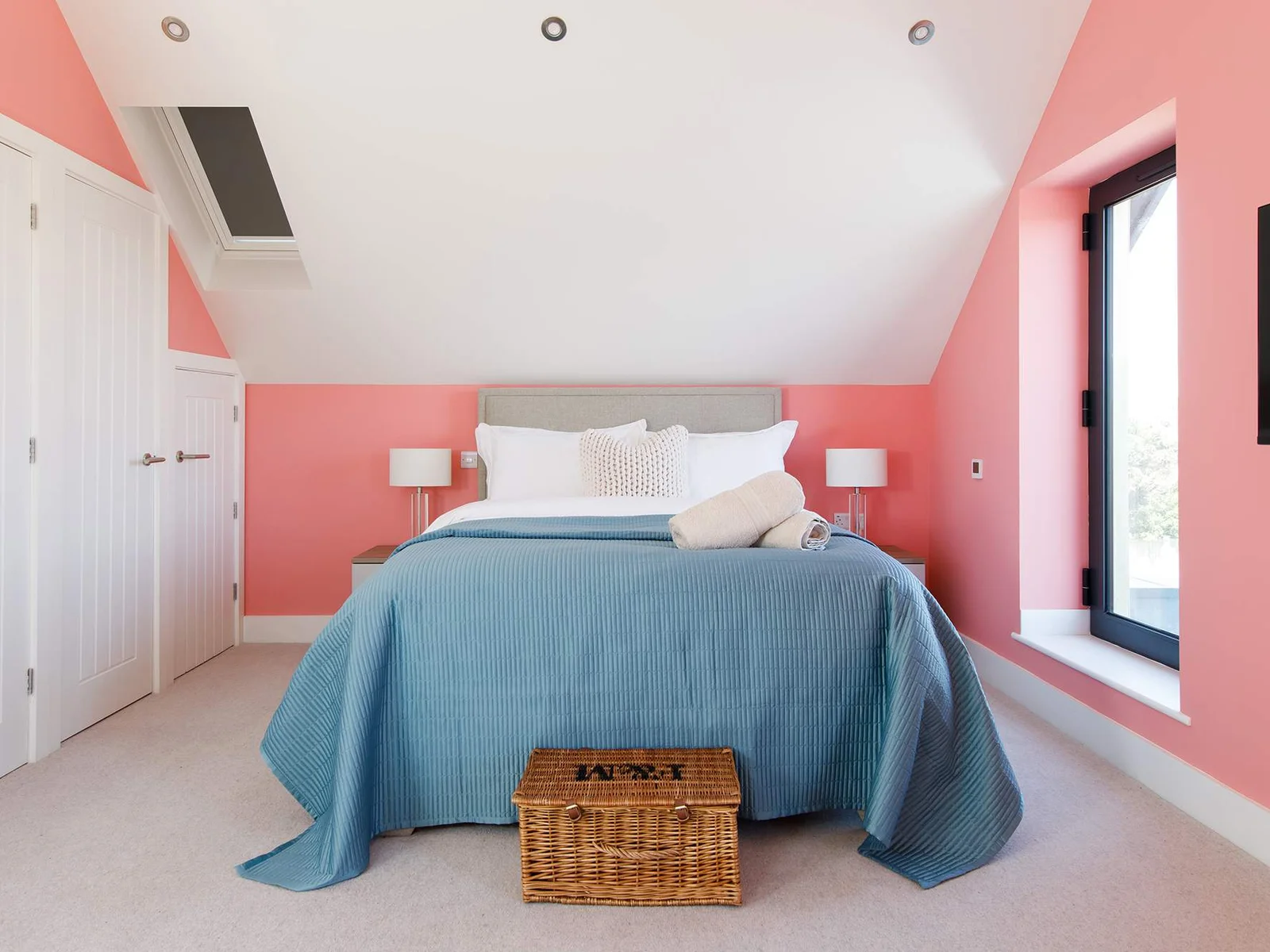 The second suite is a bright, modern room at the rear of the home.