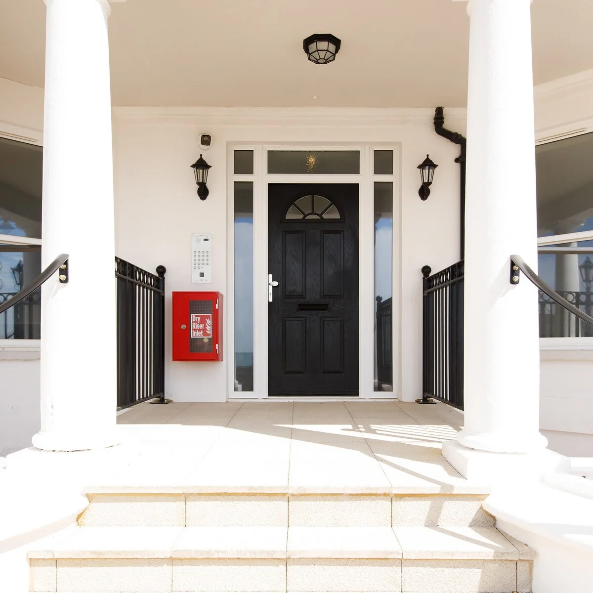 The impressive entrance to the apartment building – The Royal.