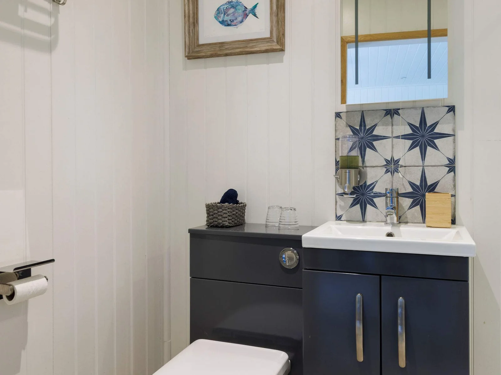 This en-suite is the perfect place to freshen up after a day at the beach or before heading out for dinner.