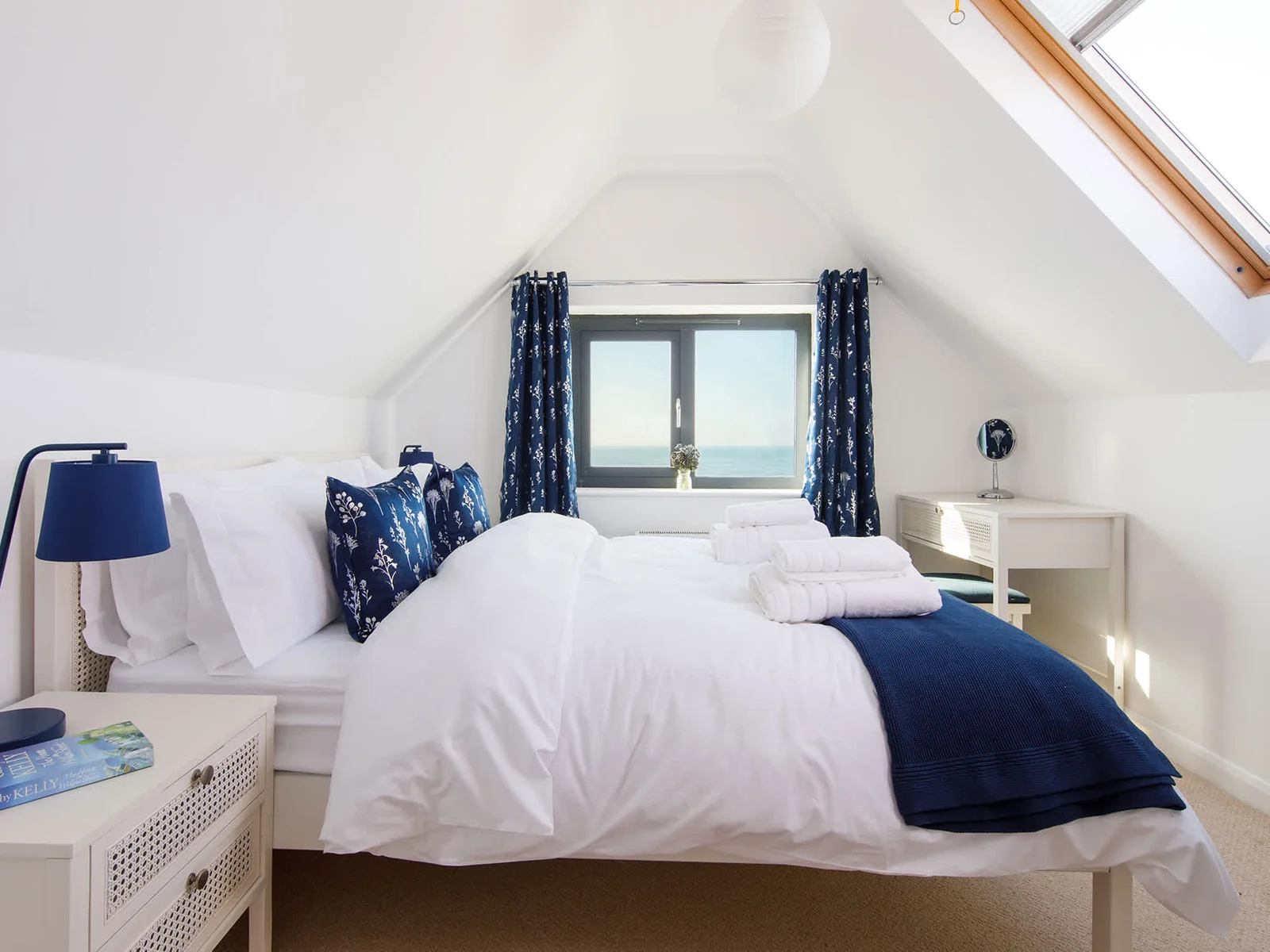 This king room has stunning views across the ocean.