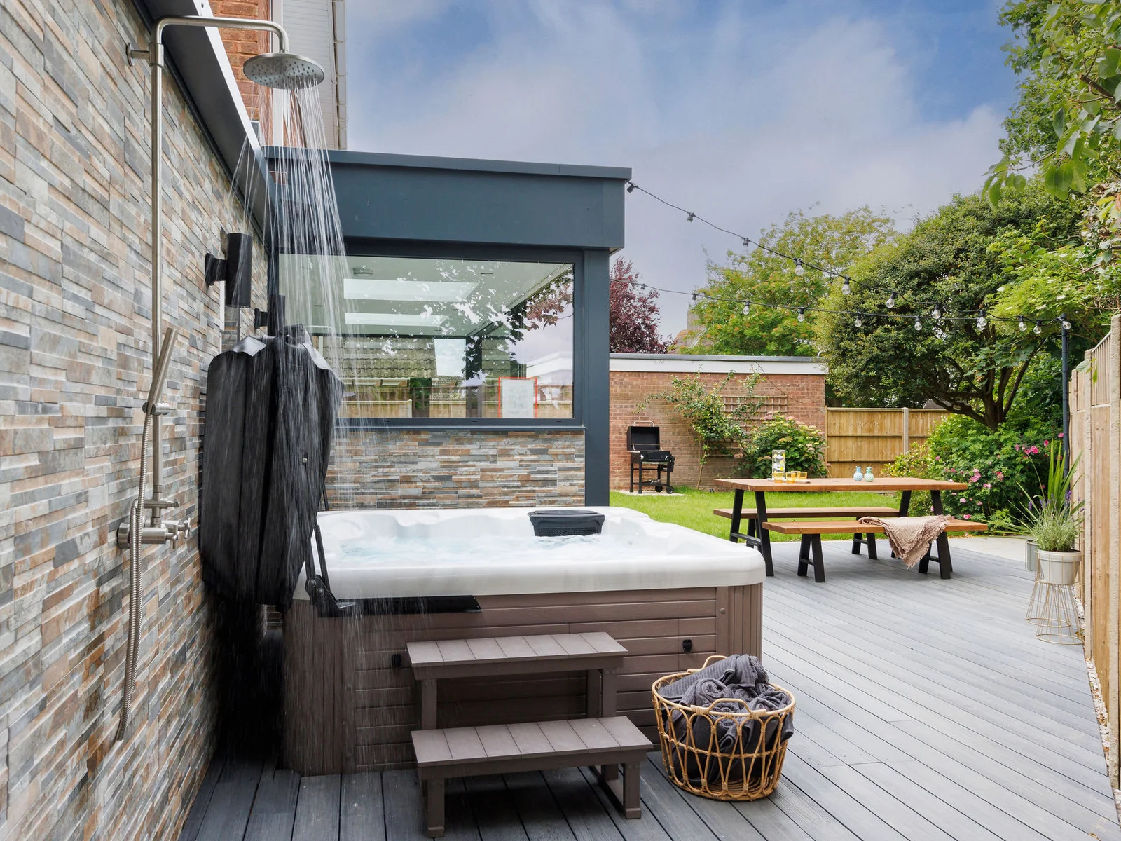 Relax in the hot tub with an outdoor shower