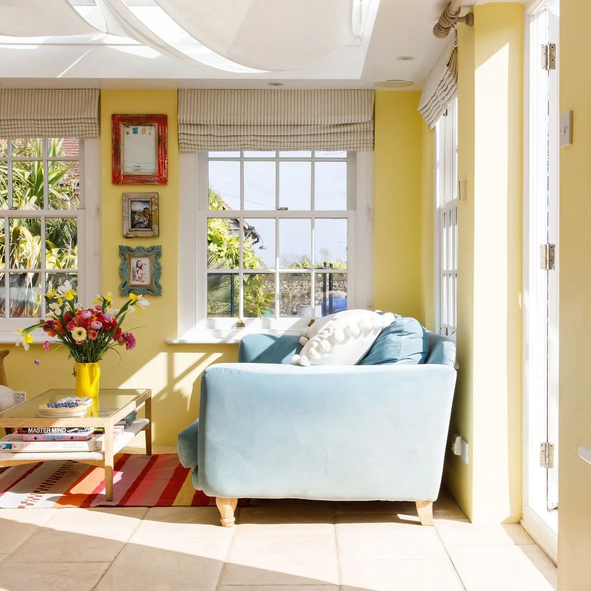 The sunny orangery lets plenty of natural light flood in.