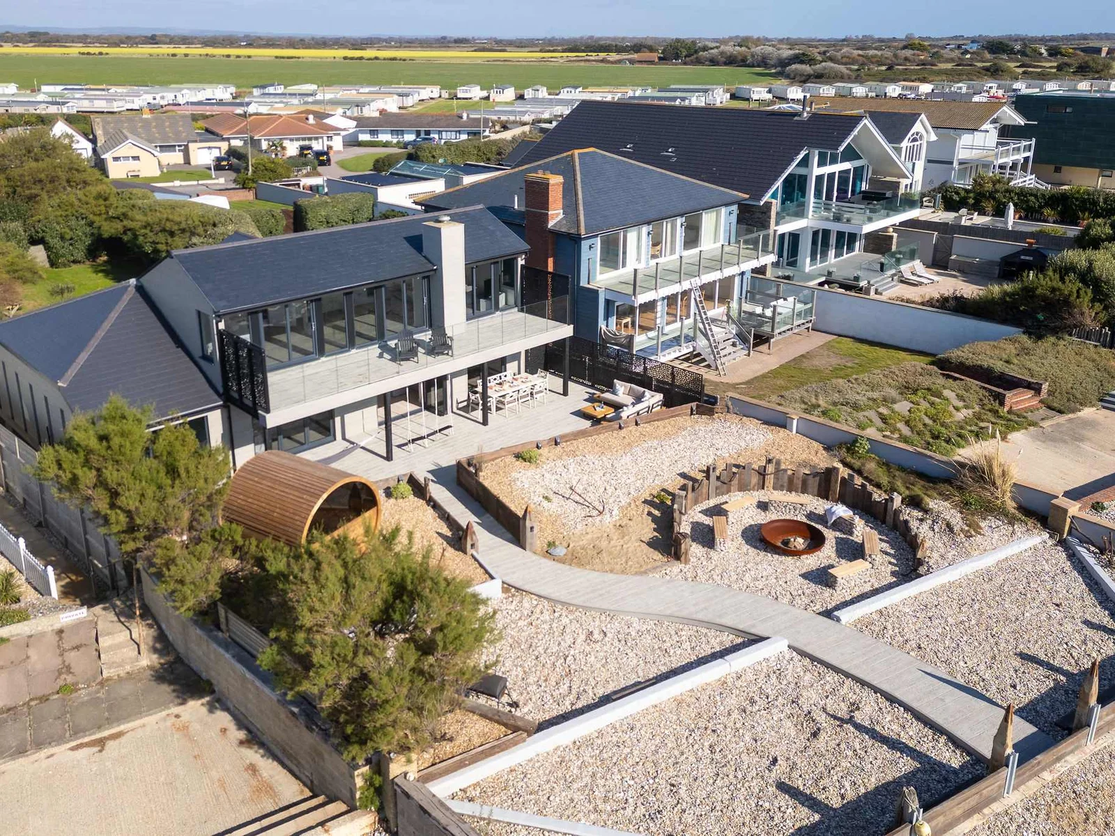 The recently landscaped seafront garden, thoughtfully designed to create different spaces to rest, eat, relax, and rejuvenate by the ocean.