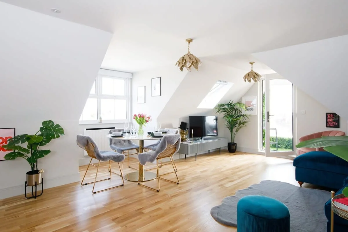 The living area conveniently combines the living room with the kitchen and dining area.