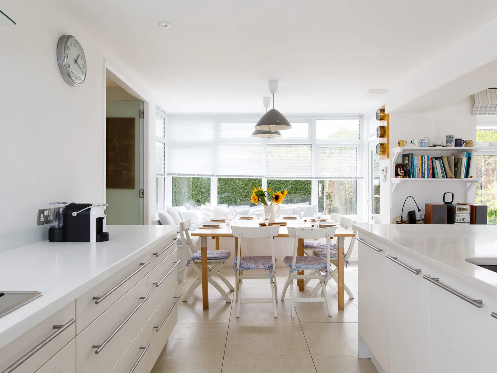 The dining area is connected to the kitchen.
