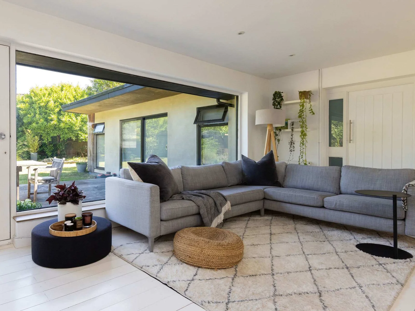 Sink into the sofa and enjoy garden views from the lounge