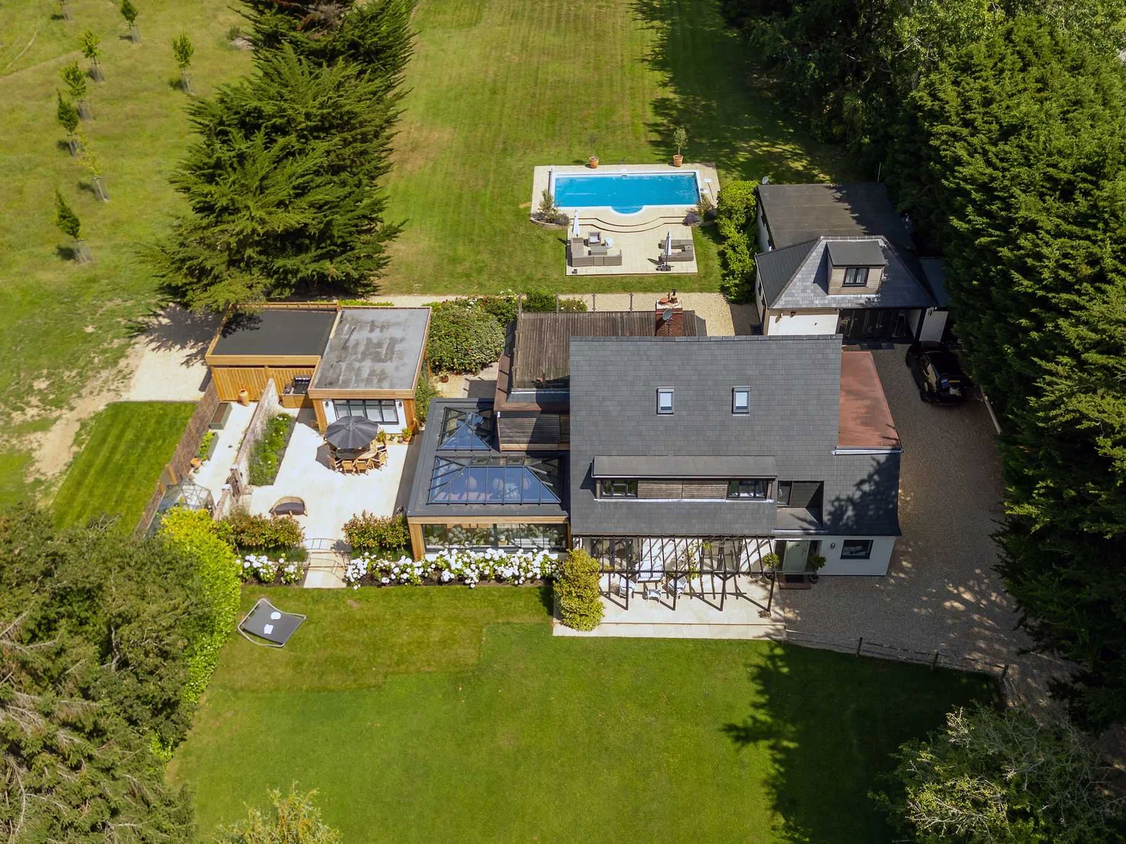 Aerial view showcasing the holiday home, private grounds and exceptional outdoor leisure facilities
