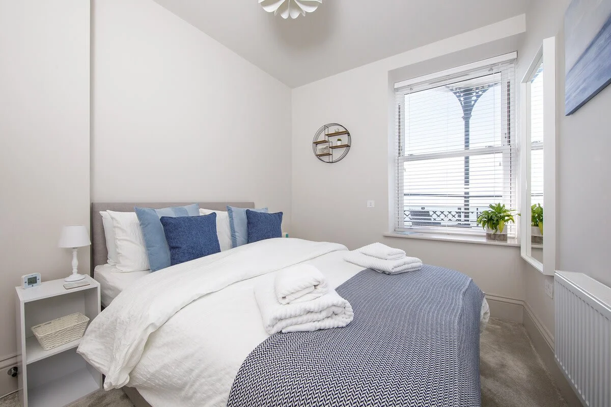The beautiful king size bed in the main bedroom