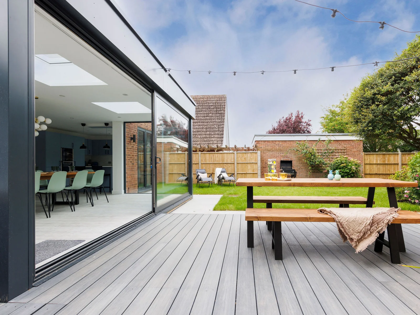 Serene backyard with hot tub and dining area