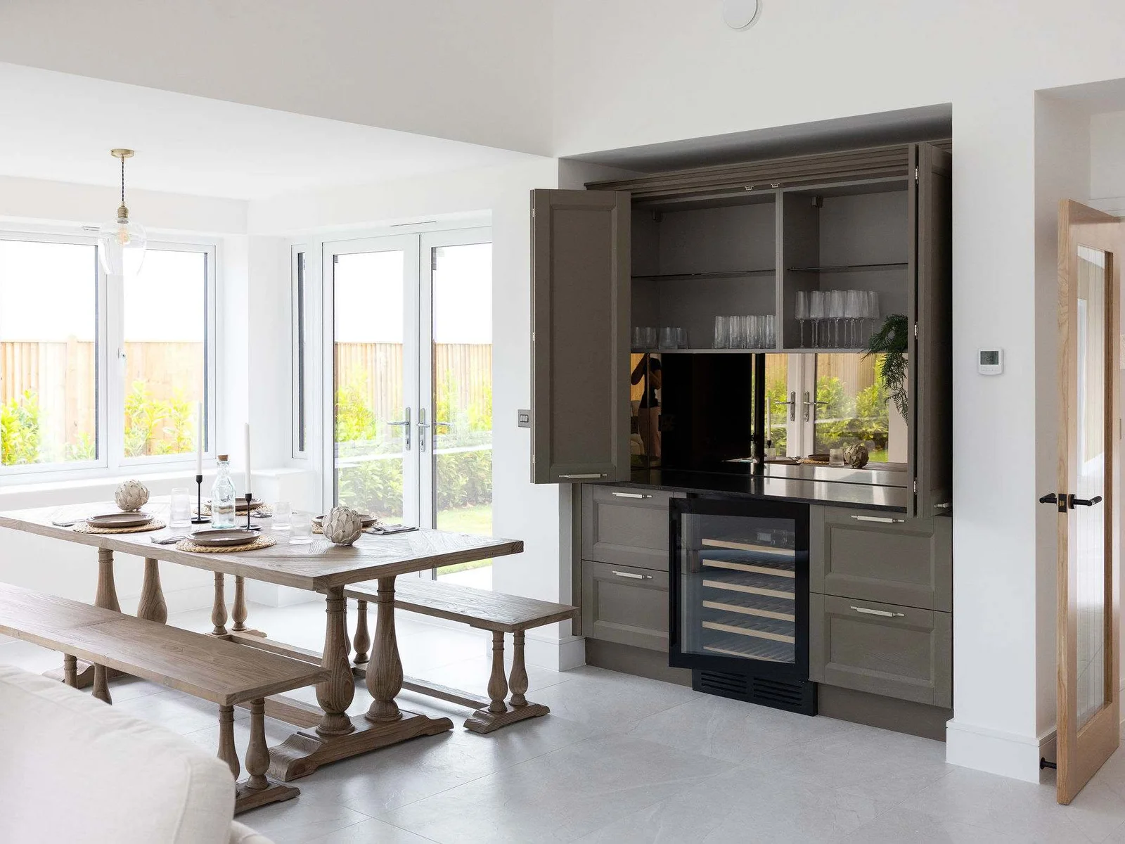Elegant dining area with fully equipped kitchen