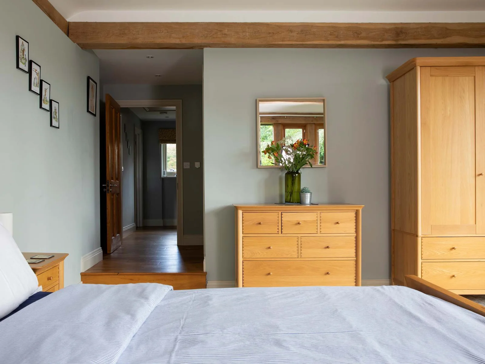 The view from the master bedroom into the hallway. The kids room is really close so parents can hear their little ones.