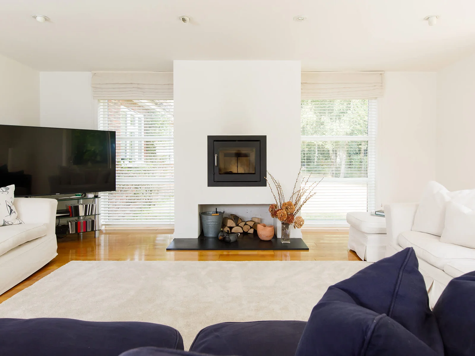 The lounge has a Smart TV, DVD player and log burner.