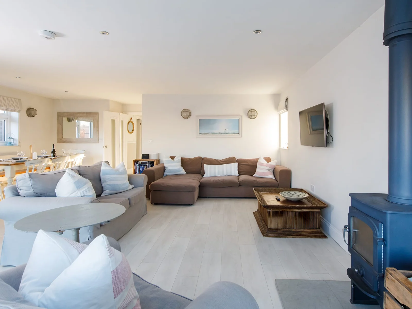 The living area has comfy sofas and a log burner to light during cooler evenings.