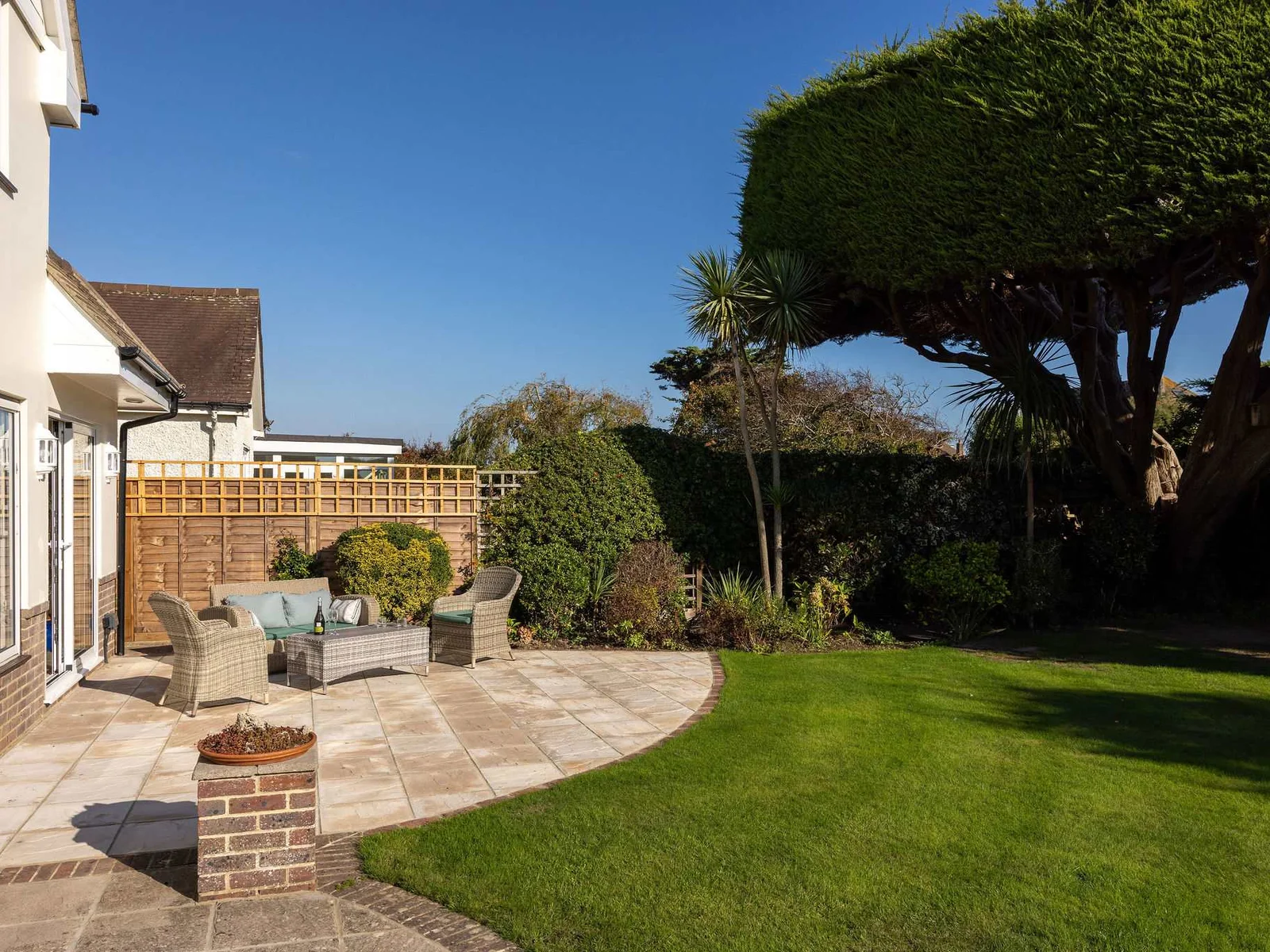Enjoy a sunny spot in the enclosed garden.