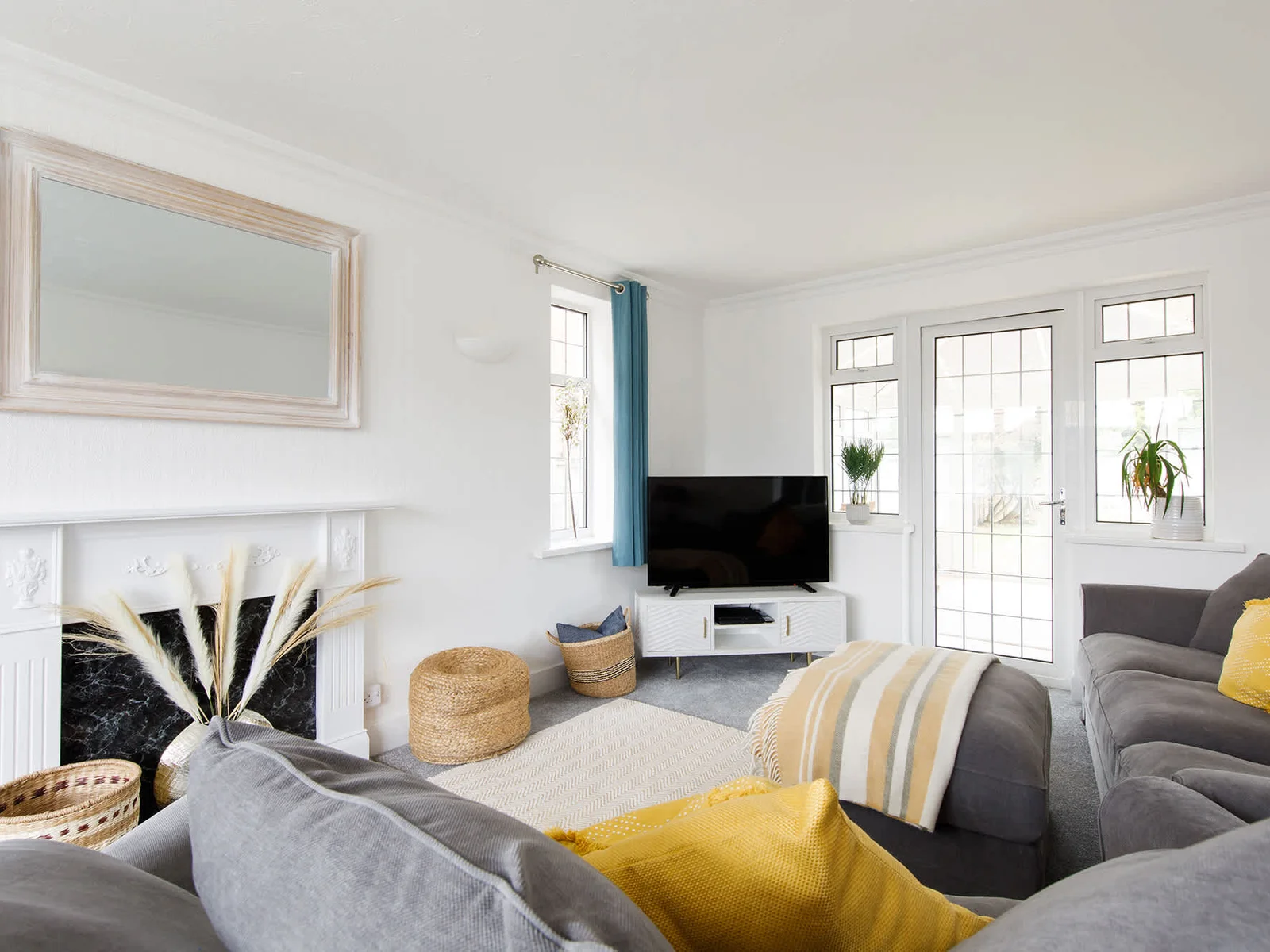 The cosy lounge opens out into the conservatory with pool table