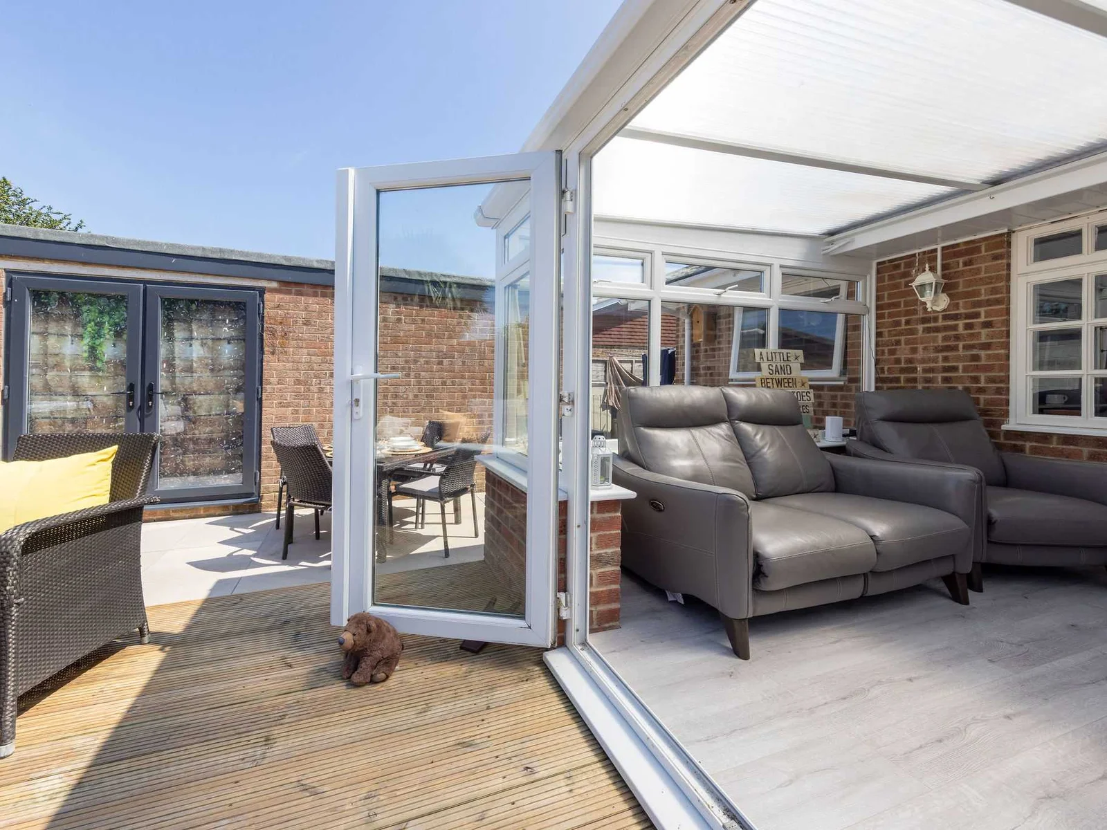 Conservatory opens onto the sunny deck