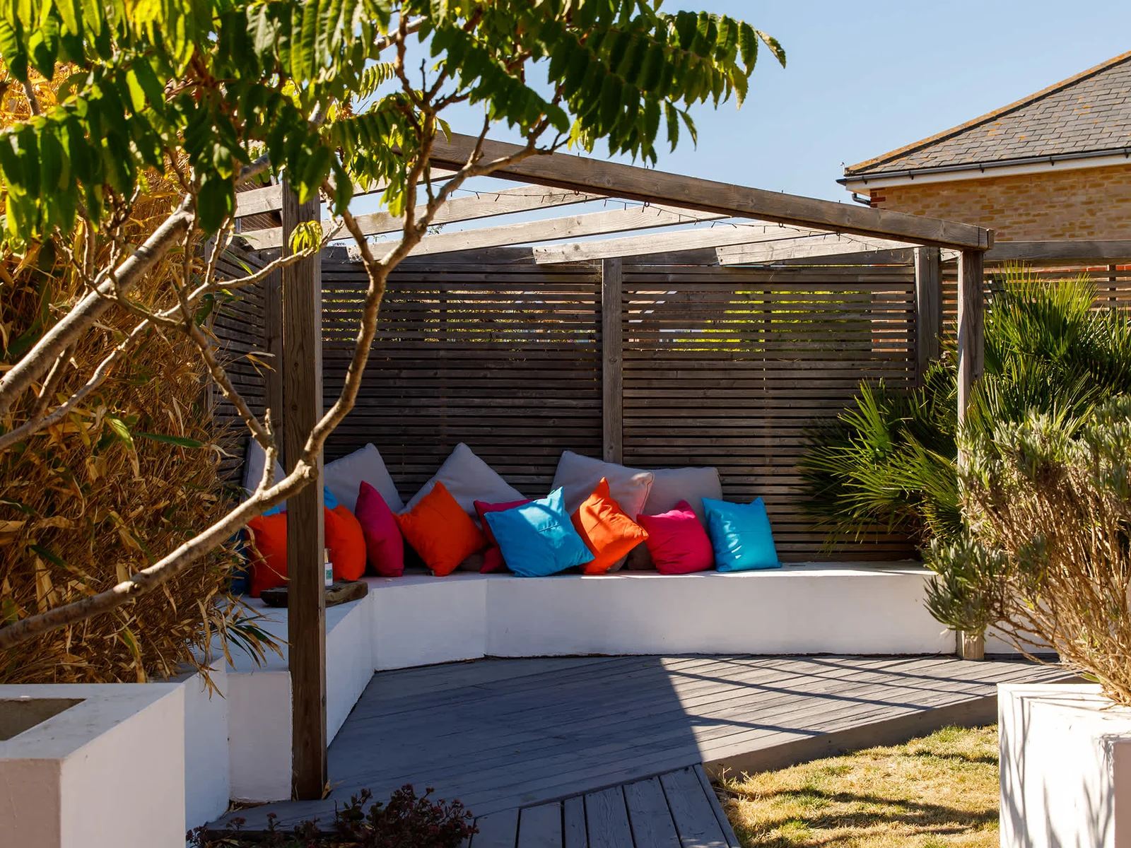The beautifully designed garden has corner seating and decking. Pick your spot, grab a book and unwind.