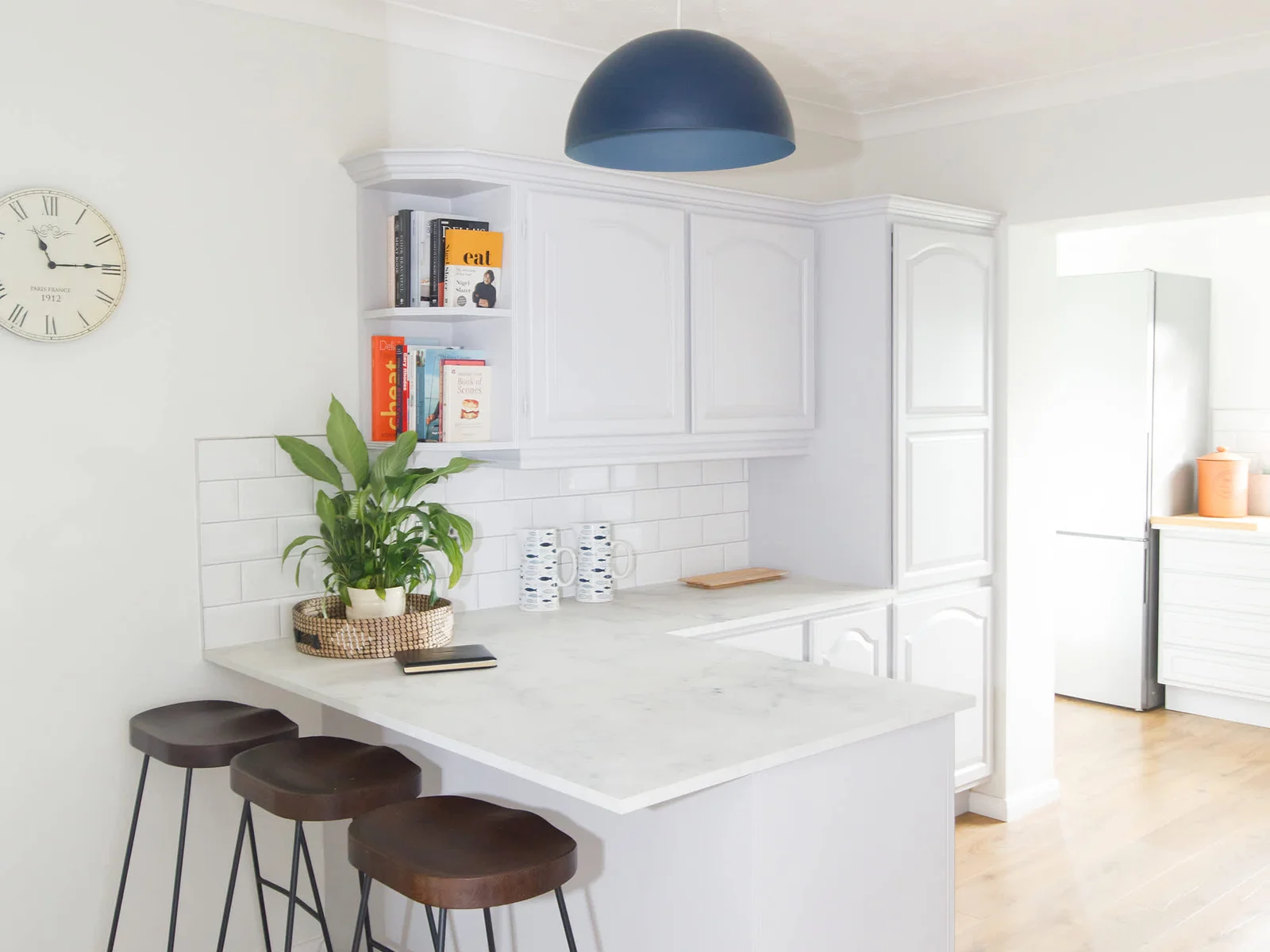 Enjoy a morning coffee at the breakfast bar in the kitchen.